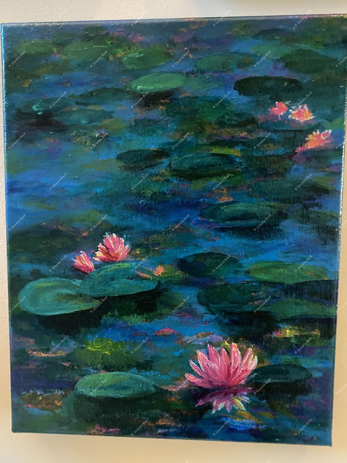 Pink Blooms on Still Water